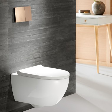 Geberit Acanto WC with Sigma70 flush plate in rose gold